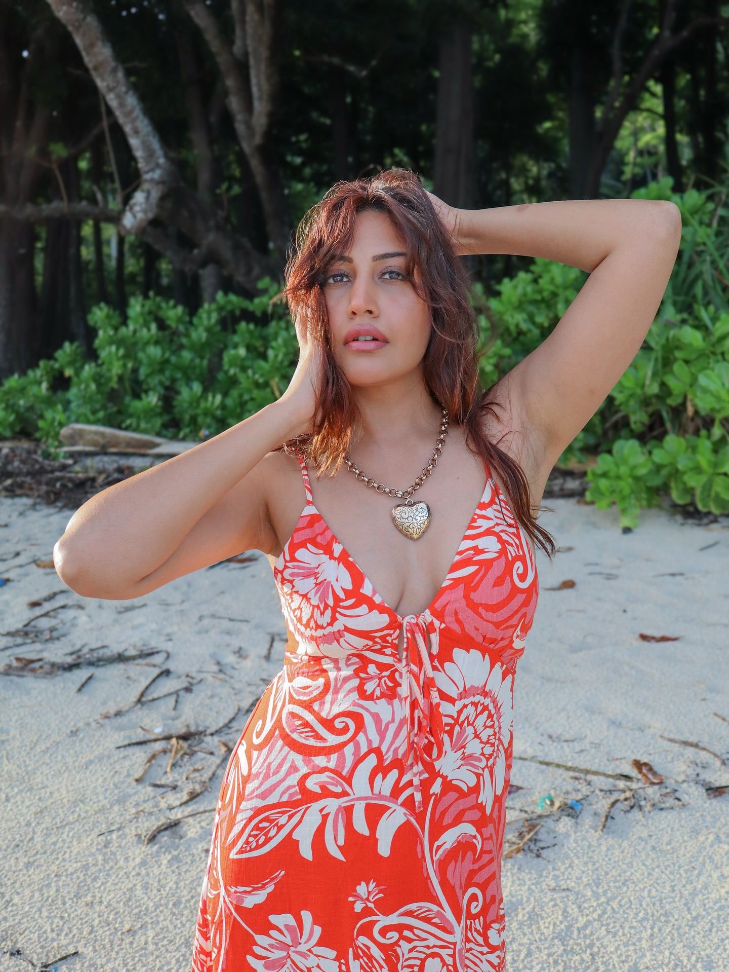 Surbhi's bold look with a chunky heart necklace.