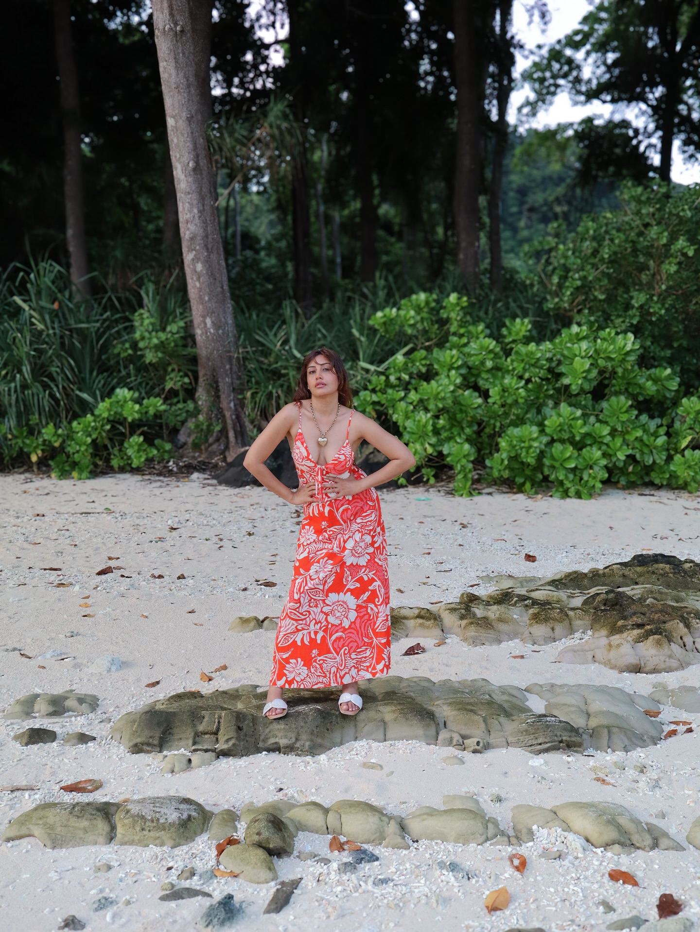 Surbhi Chandna's candid pose in a red maxi dress.