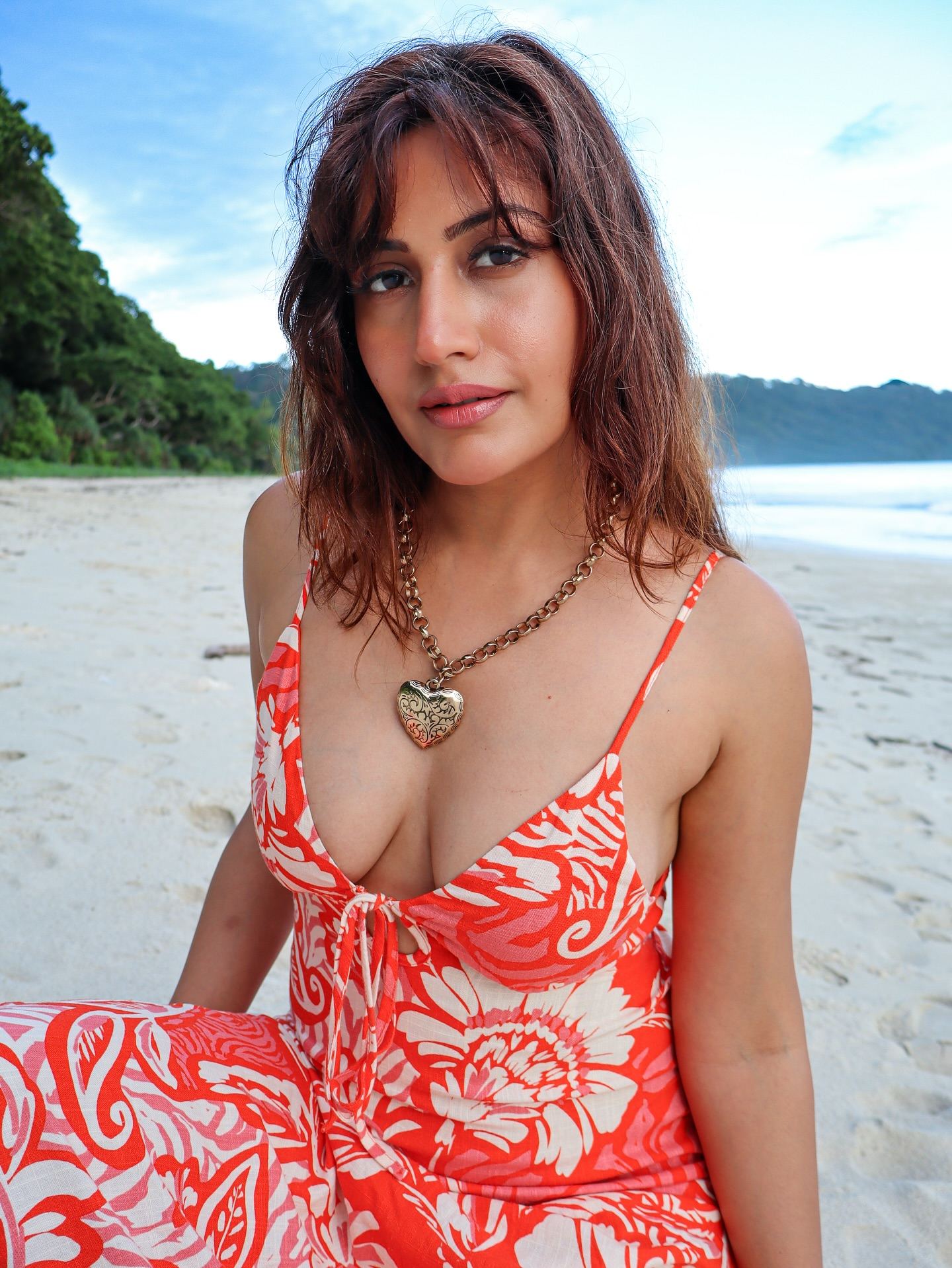 Beach Bombshell Surbhi in a Fiery Red Look
