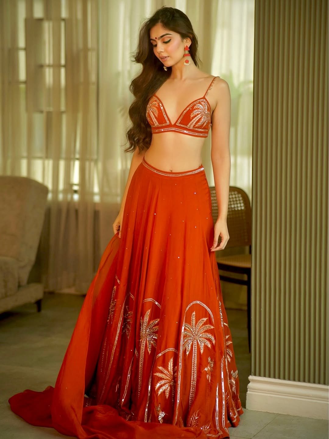 Viddhi Giri Poses Gracefully In A Red Lehenga