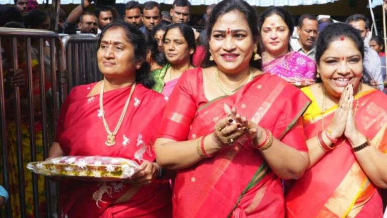 Women legislators in red sarees Dassera