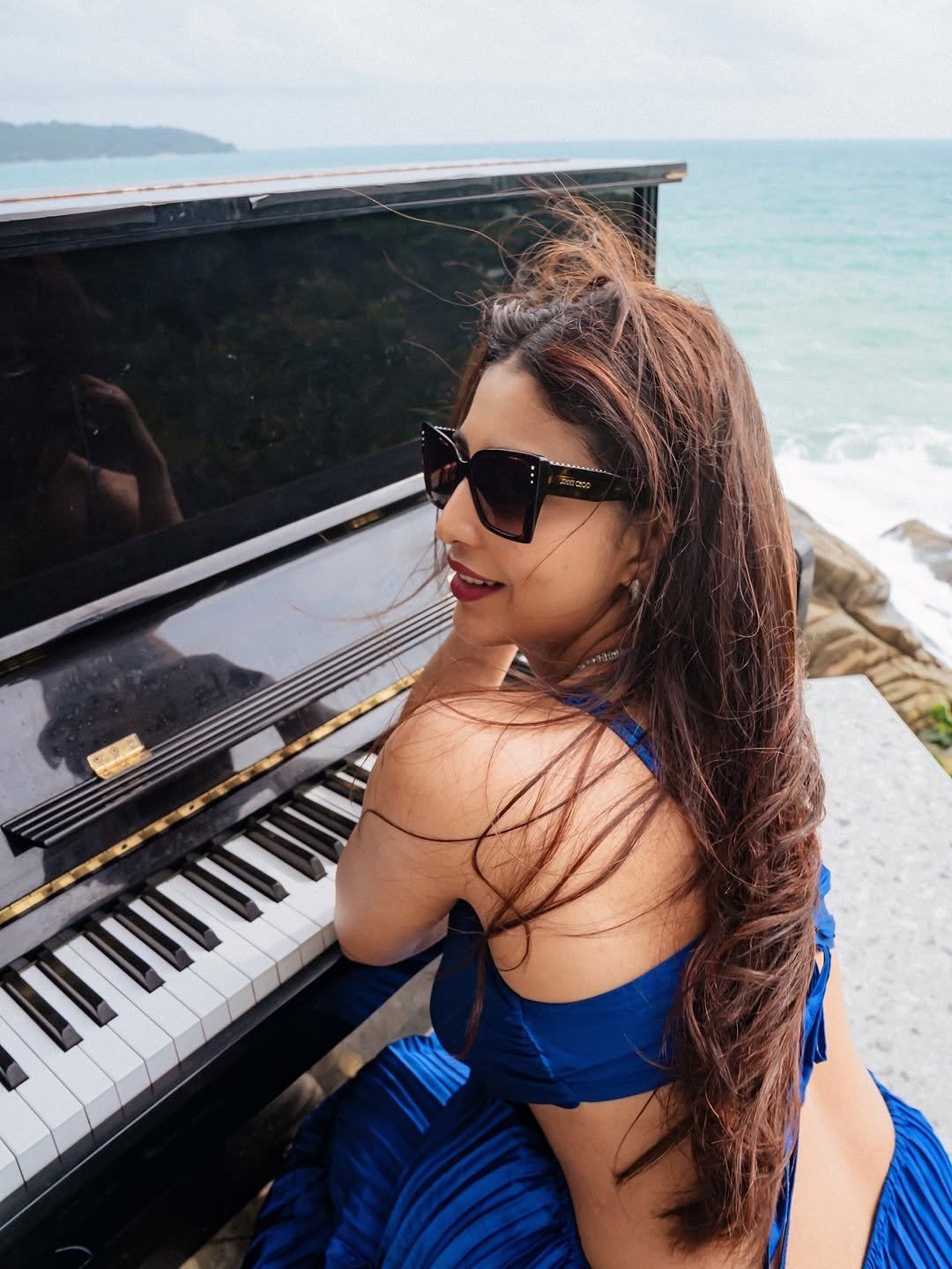 Daksha Nagarkar At Piano In Blue Outfit