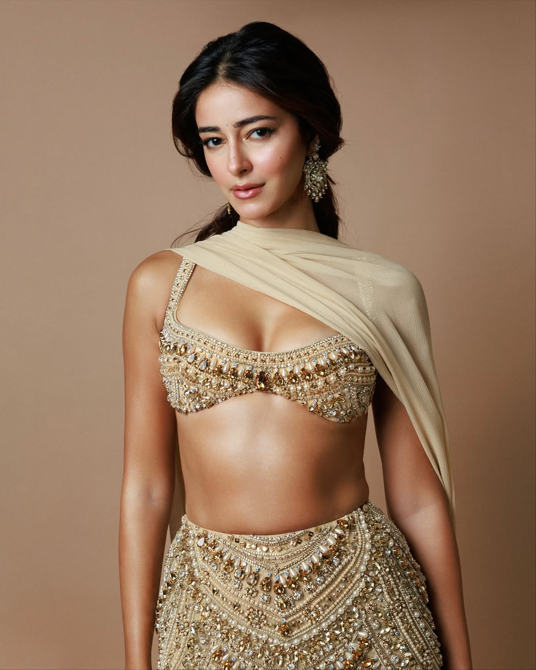 Ananya Panday Elegant Pose In Gold Outfit