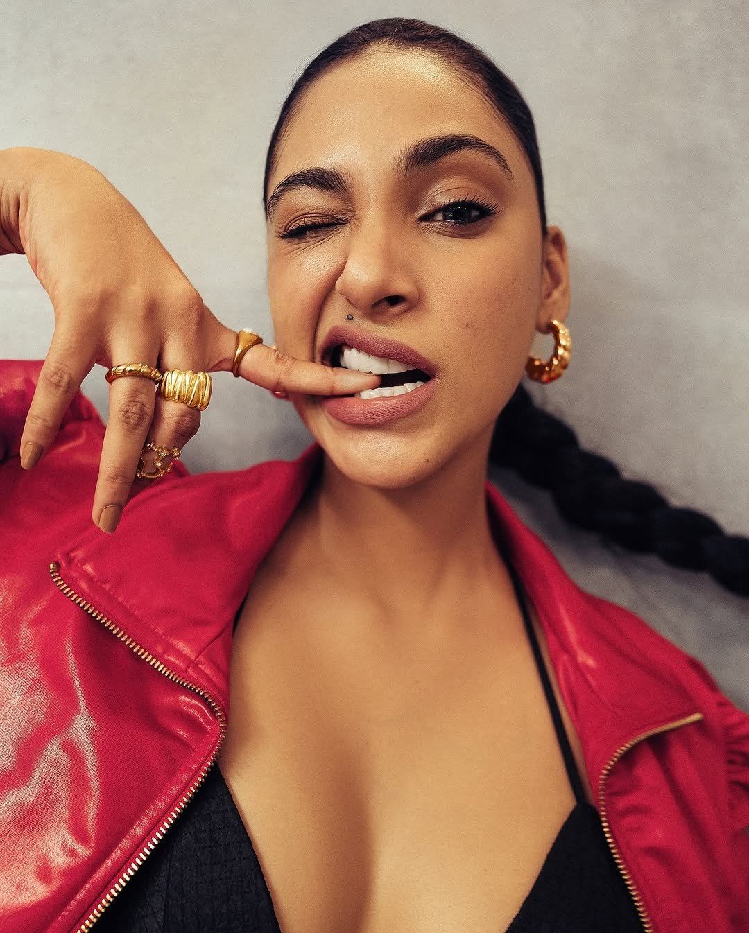 Anukreethy Vas Bold Black Bra Red Jacket Look