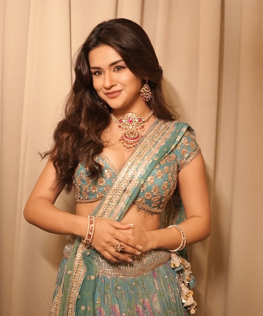Avneet Kaur Adjusting Earrings Elegantly