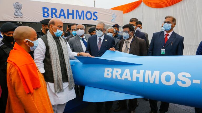 Defence Minister Rajnath Singh at the BrahMos missile production facility handing over missiles to the Indian Army, with a warning aimed at Pakistan.