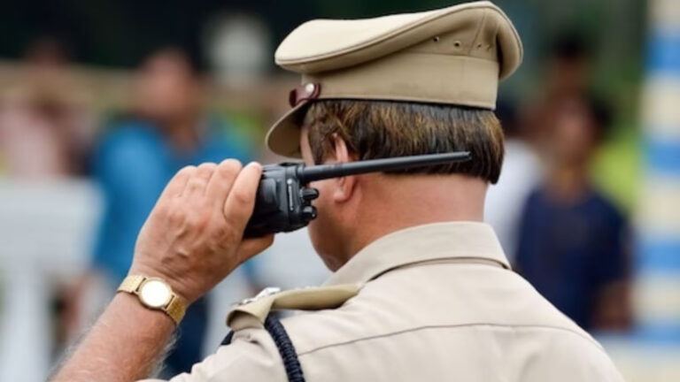Former minister Perni Nani arguing with police officers at Machilipatnam station