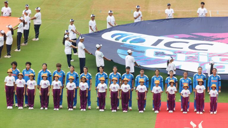 IND W and AUS W players wearing black armbands