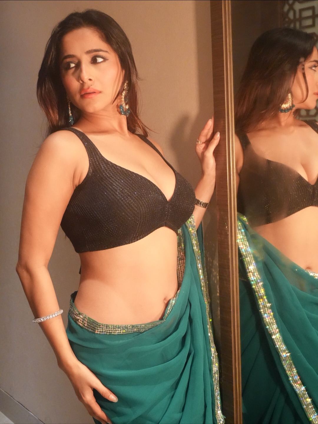 Kate Sharma Captures Grace In Green Saree