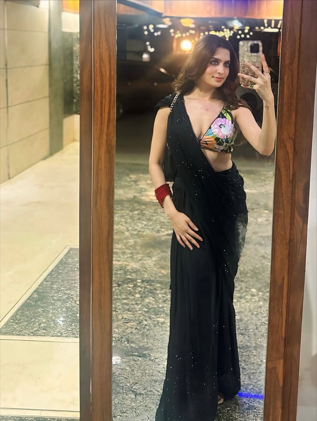 Krushna Patil In Black Saree Glam Pose
