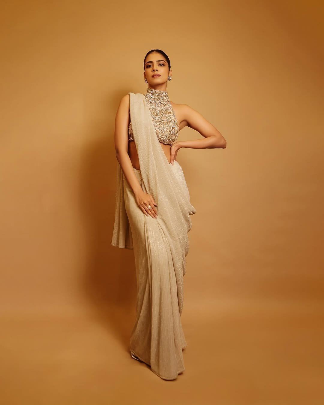 Malavika Mohanan Elegant Look In Golden Hue