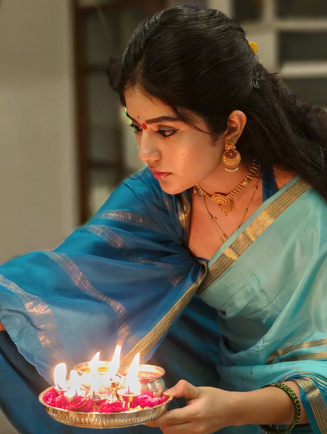 Meghaa Shetty Lights A Lamp Gracefully