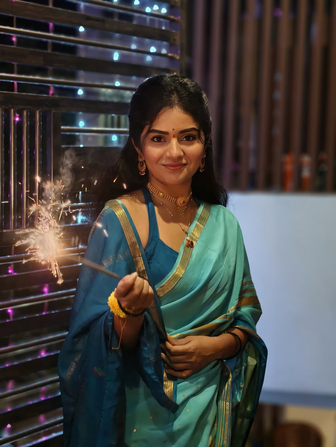 Meghaa Shetty Poses With Diyas Beautifully
