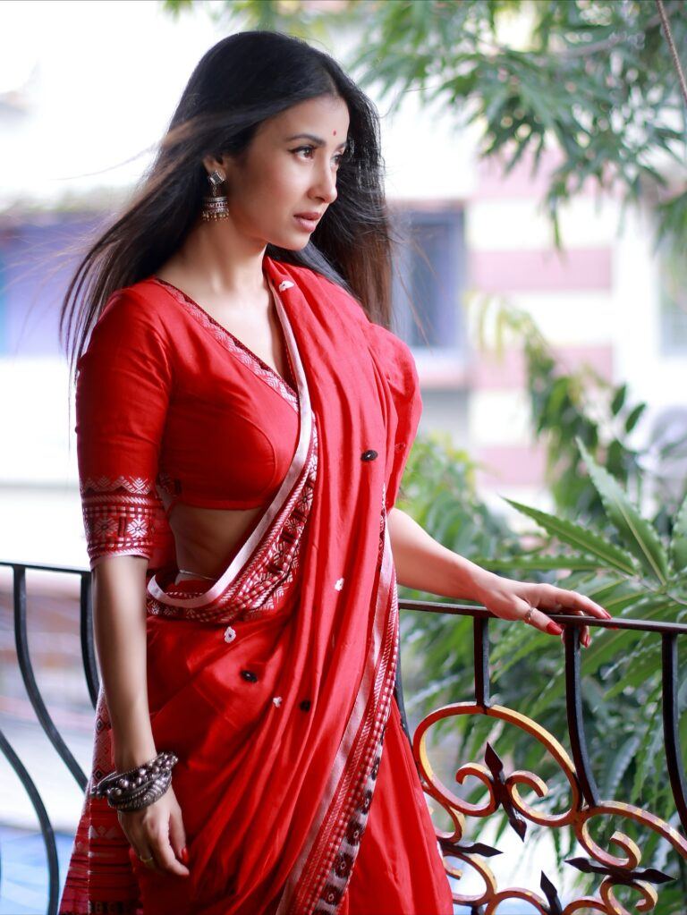 Monami Ghosh Smiles Bright In Red Saree