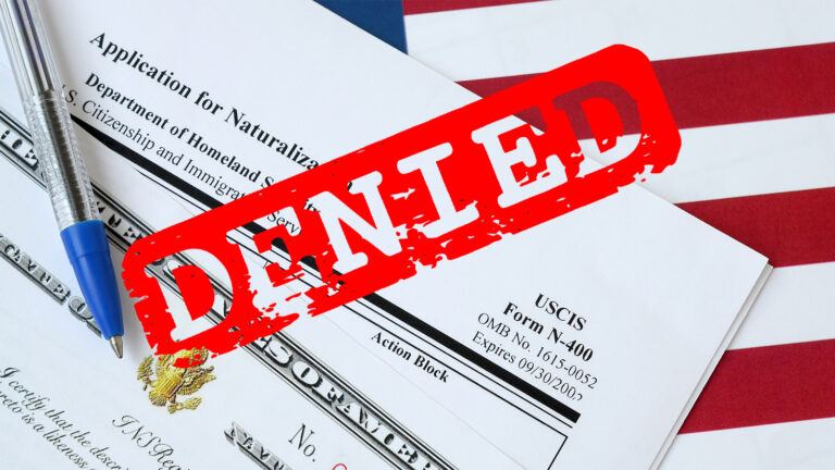 USCIS officer reviews N400 citizenship documents