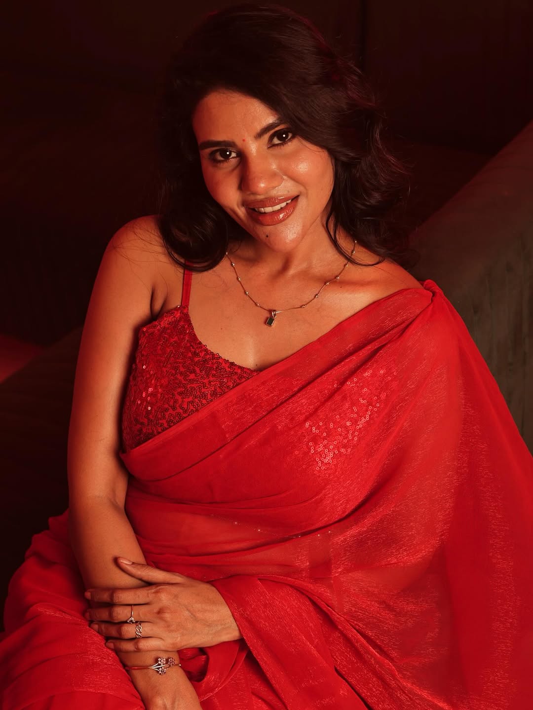 Nivisha Shines In Sequined Red Blouse