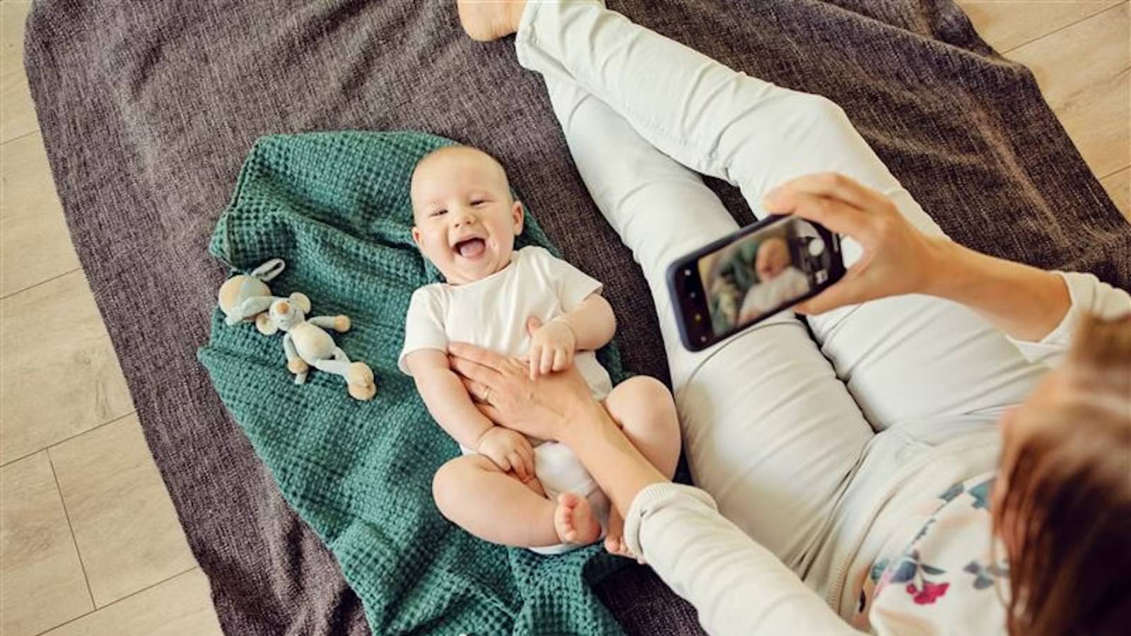 Parent sharing child photo online