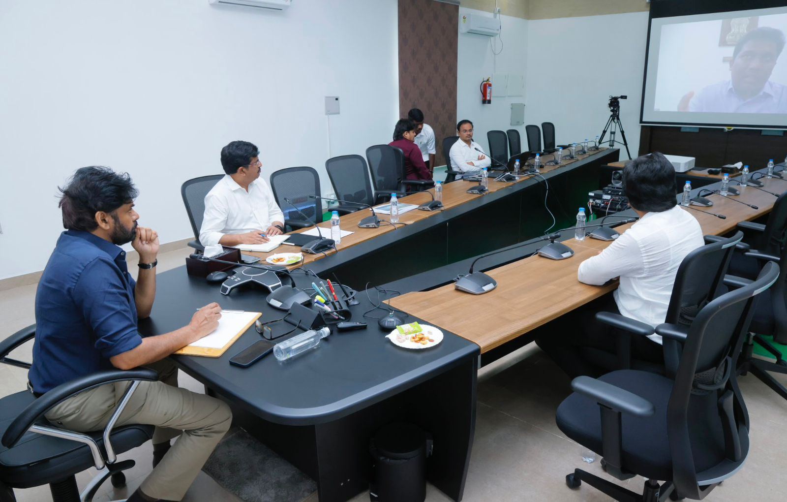 Pics: Deputy CM PK Spotted at Work In a Blue Outfit