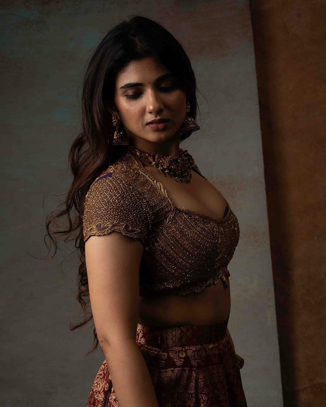 Pragya Nagra Dazzles In Gold And Red Attire