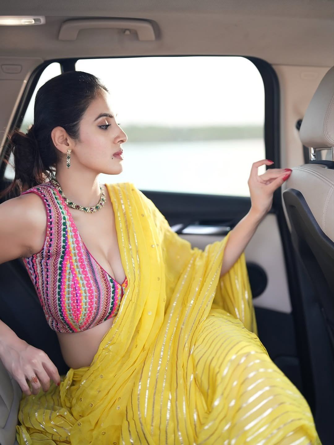 Priyanka In Car Photoshoot With Yellow Drape