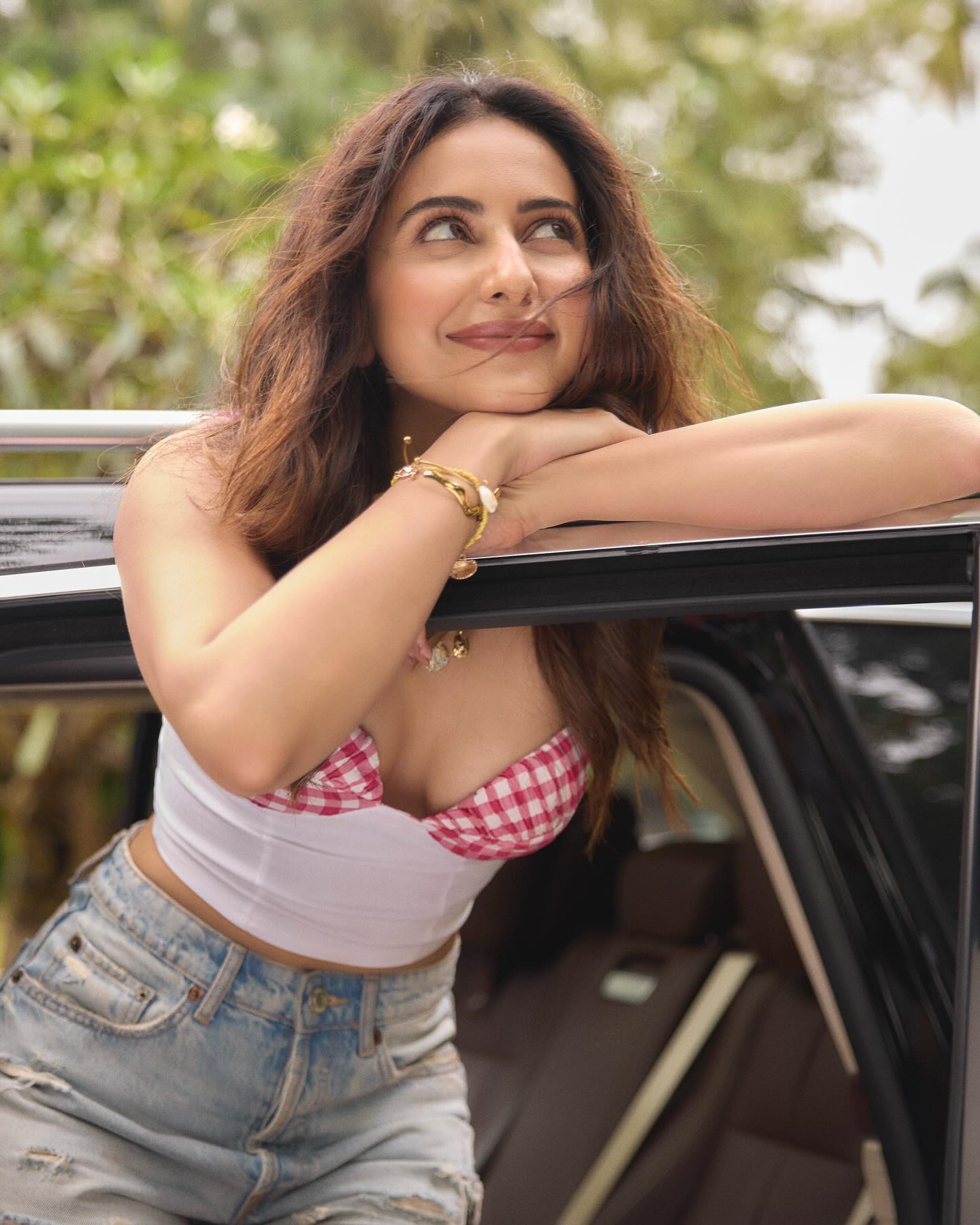 Rakul Preet Singh Poses By The Car Window