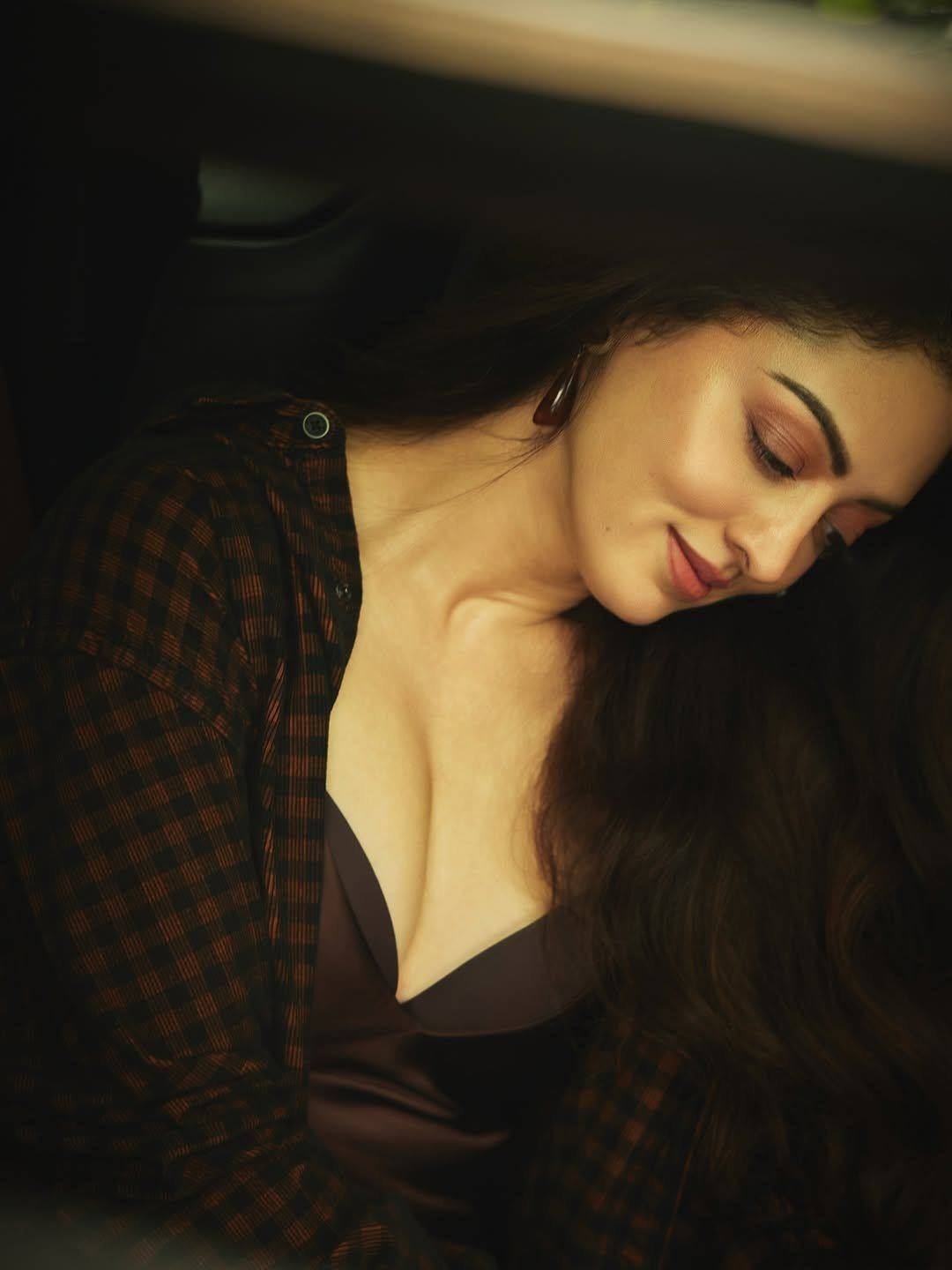 Sandeepa Dhar Sitting In Car Seat With Charm