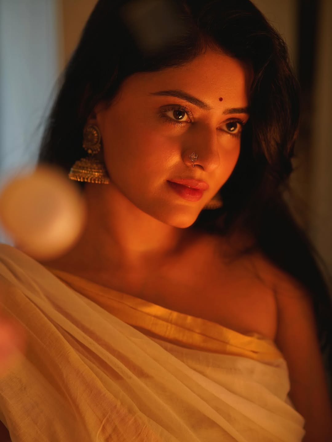 Sanya Thakurrr In White Saree And Jhumkas
