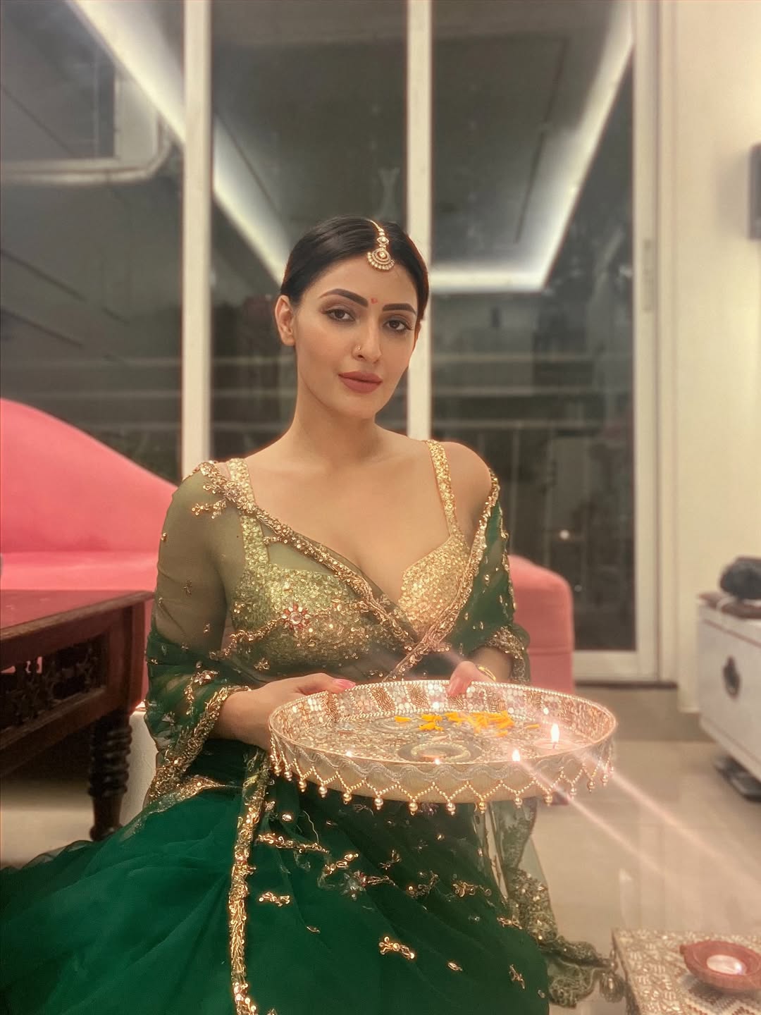 Shivangi Verma Holding Diya Tray Pose