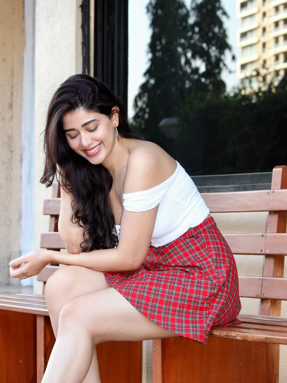 Aarti Chikara Poses Playfully In A Red Skirt