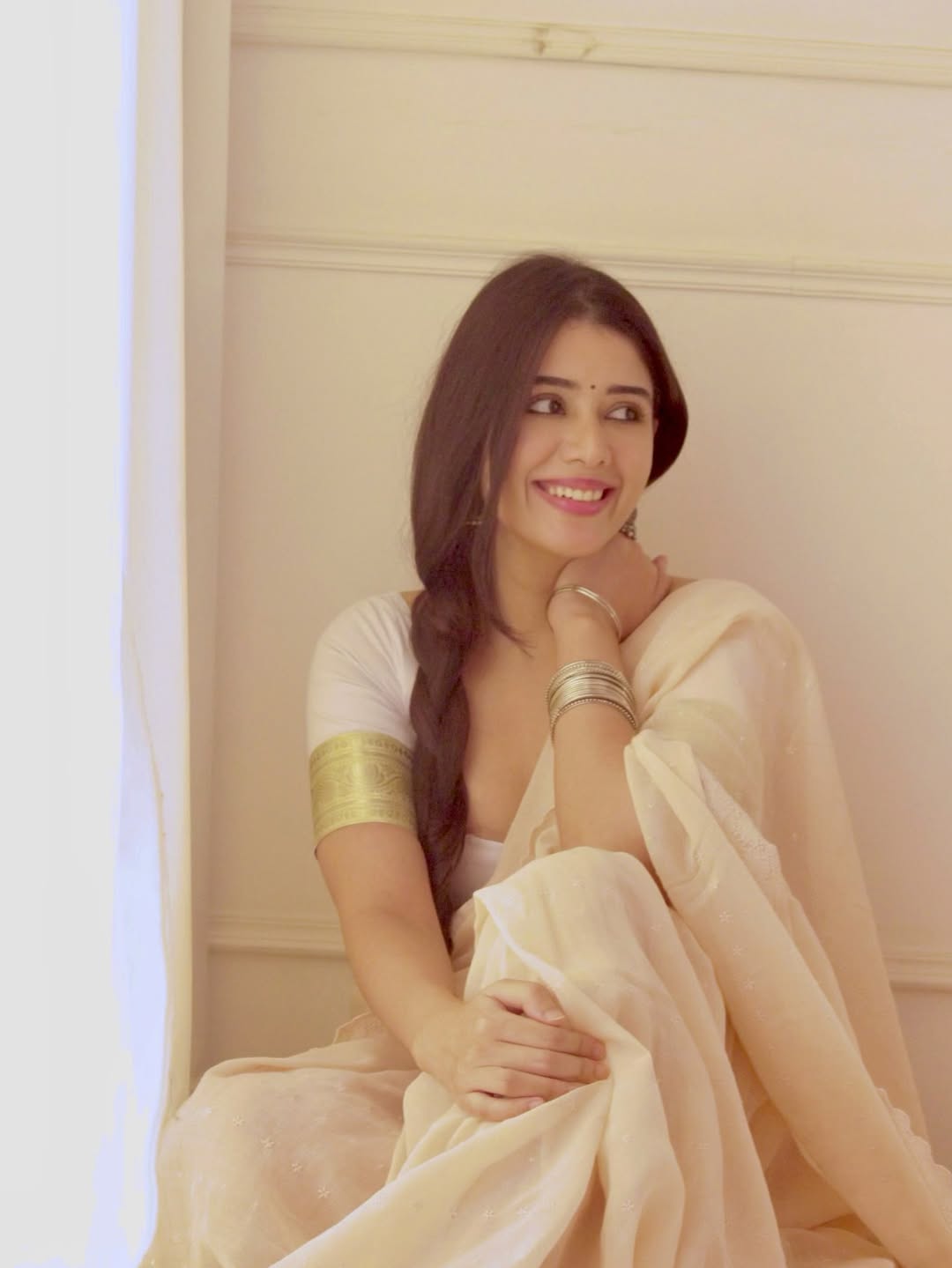 The Actress Poses With Hand On Her Chin