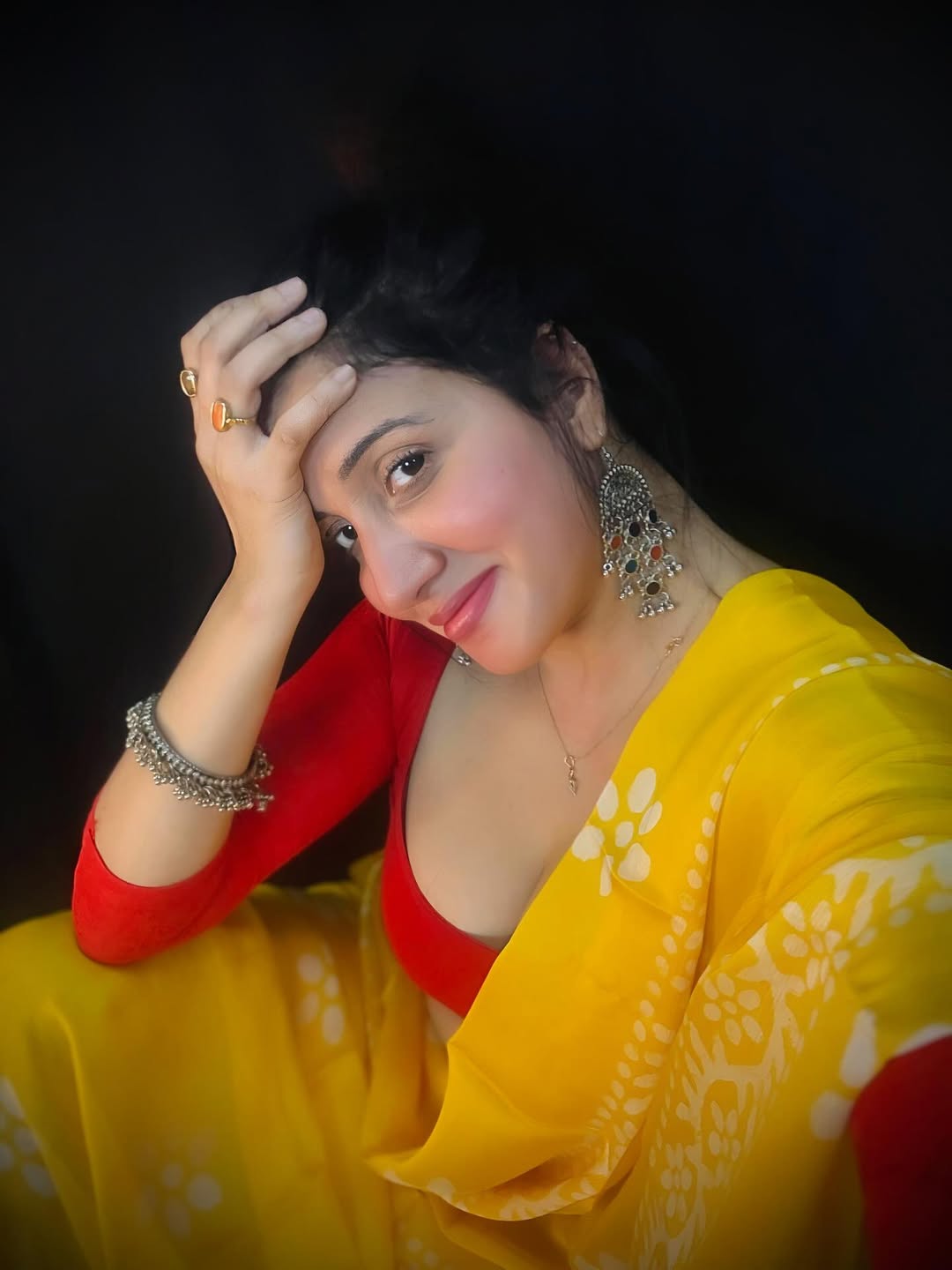 The Actress Poses With Hand On Her Forehead
