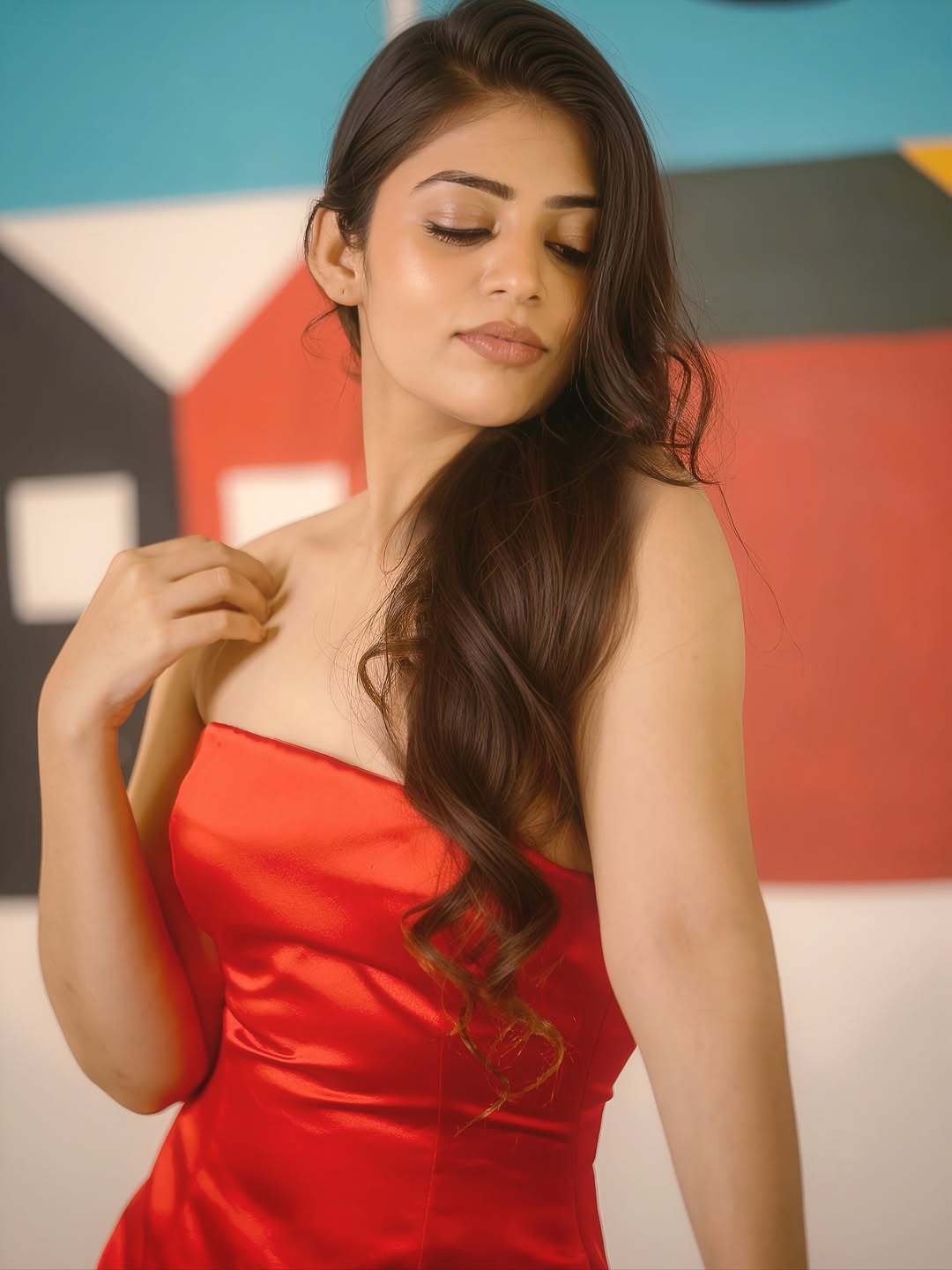 Bandhavi Sridhar's Long Wavy Hair And Red Dress