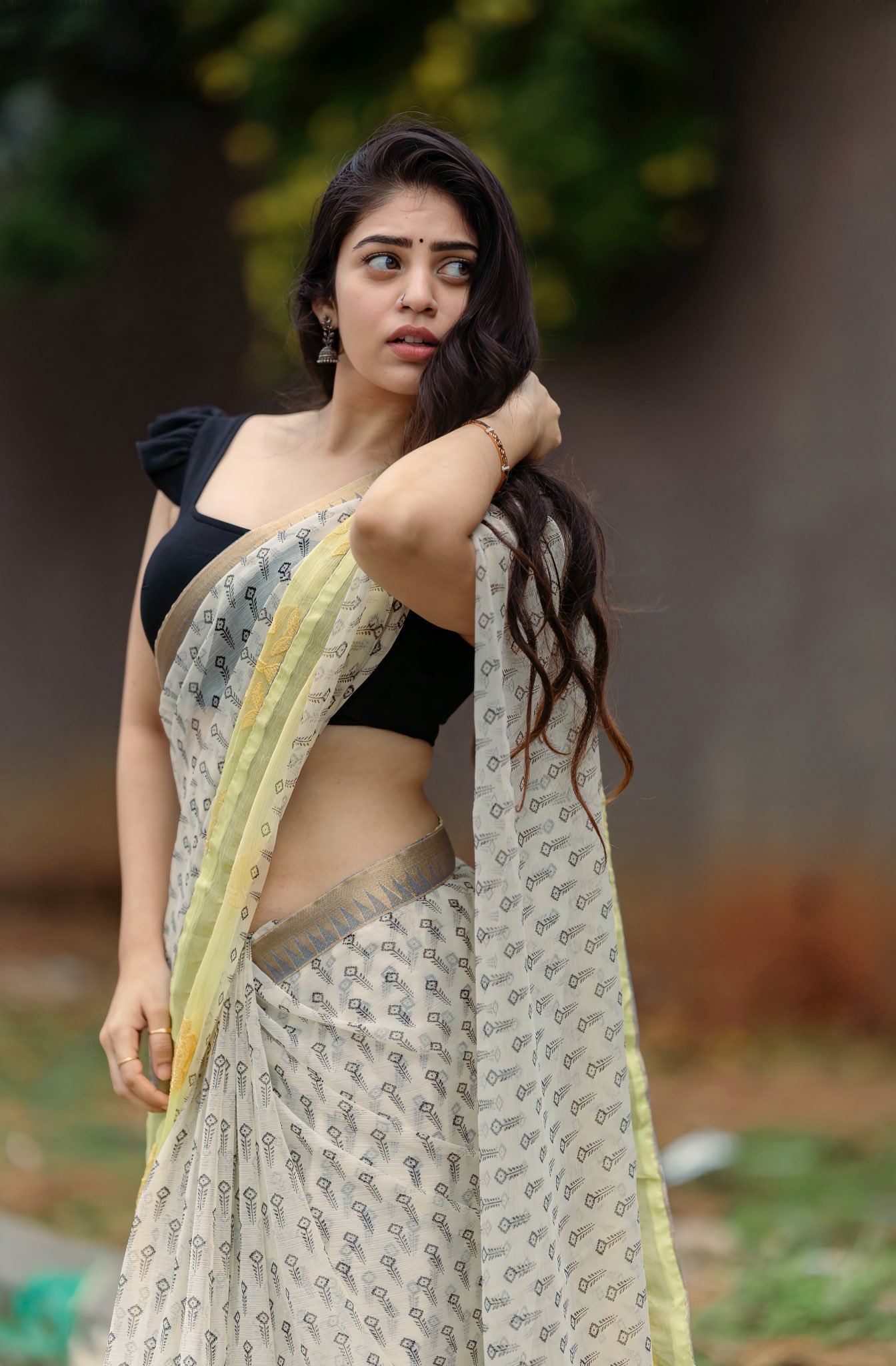 The Actress Touches Her Hair In A Candid Pose