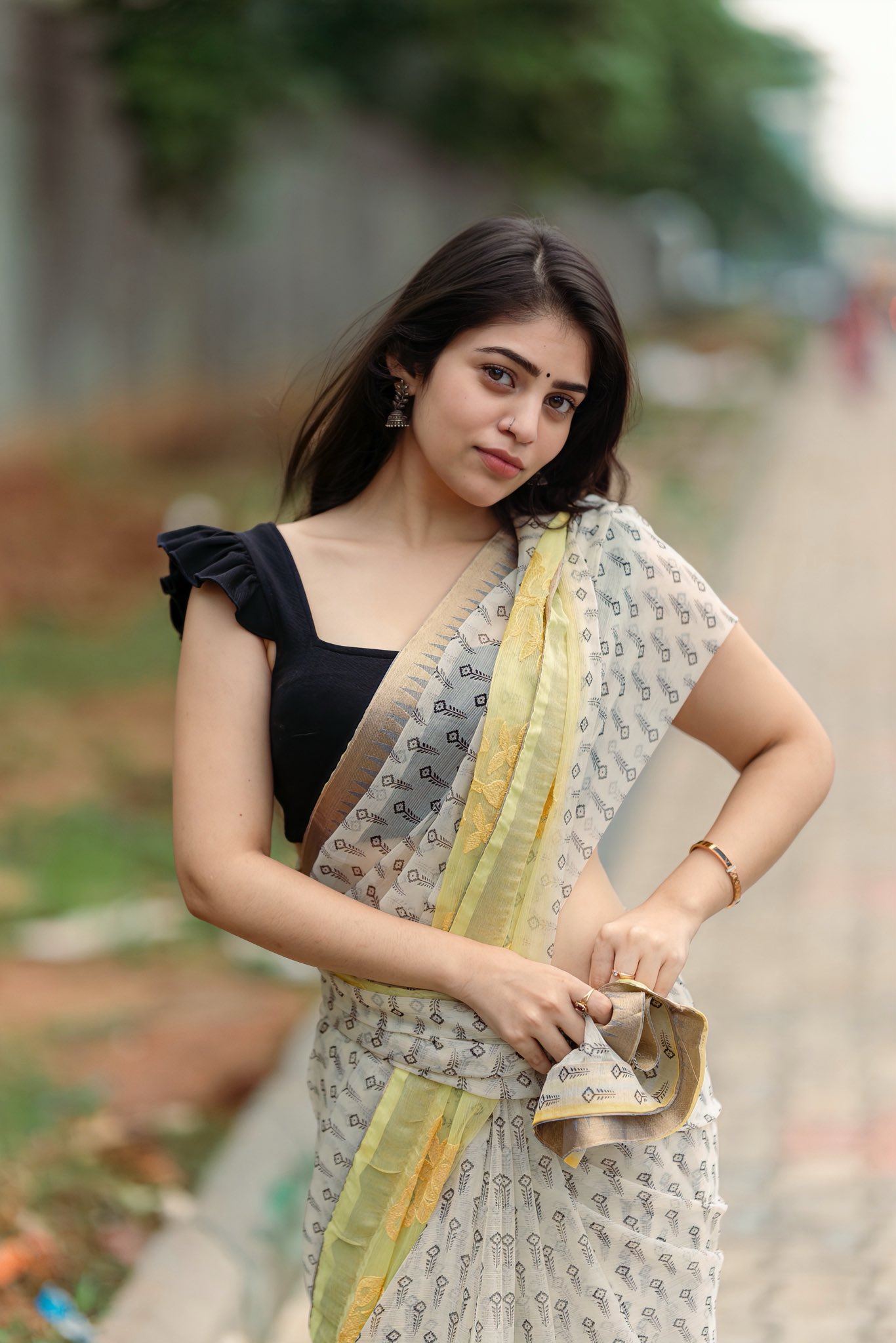 Bandhavi Sridhar's Bold Black Sleeveless Blouse