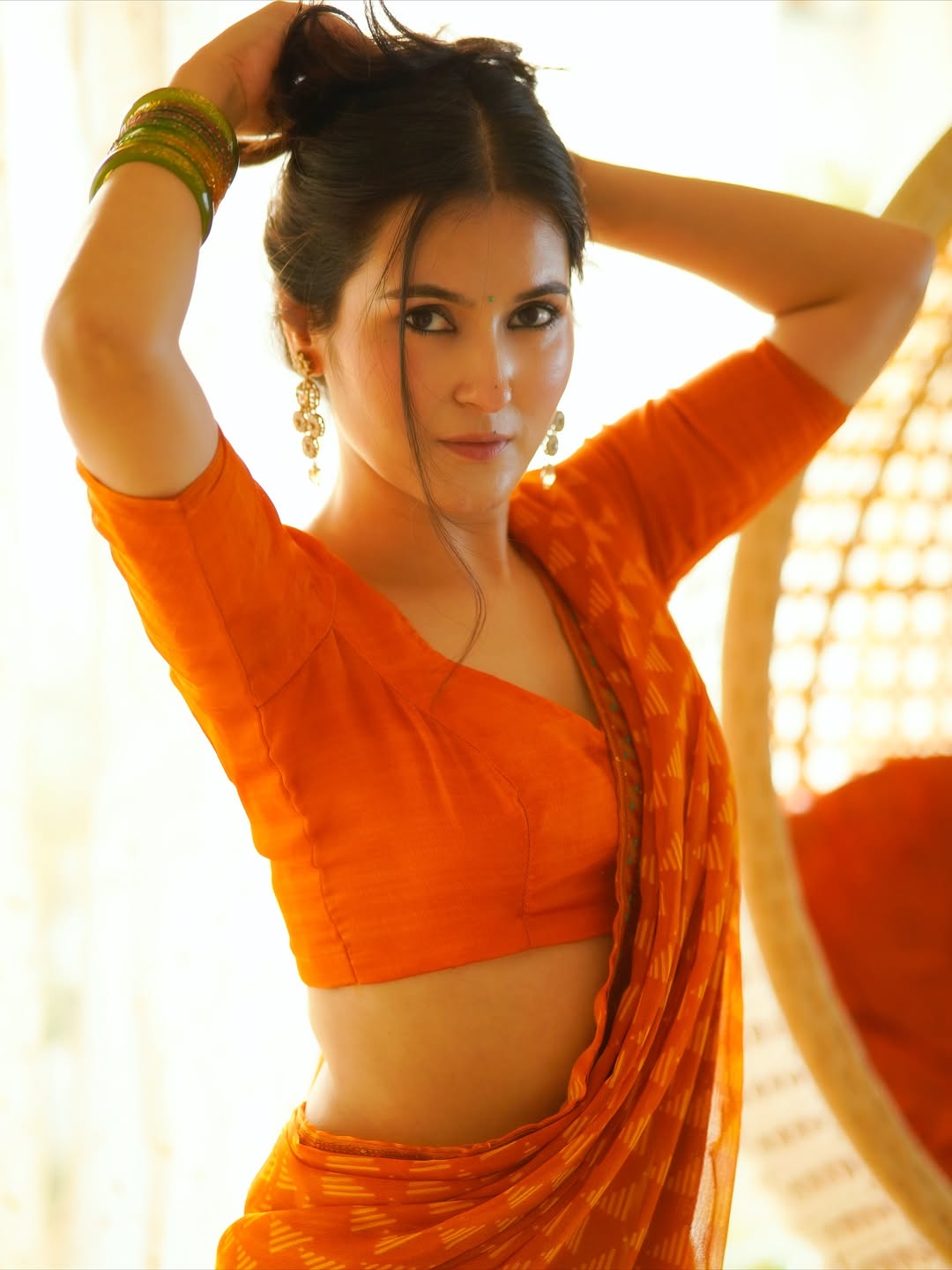 The Actress's Bold Backless Blouse Look