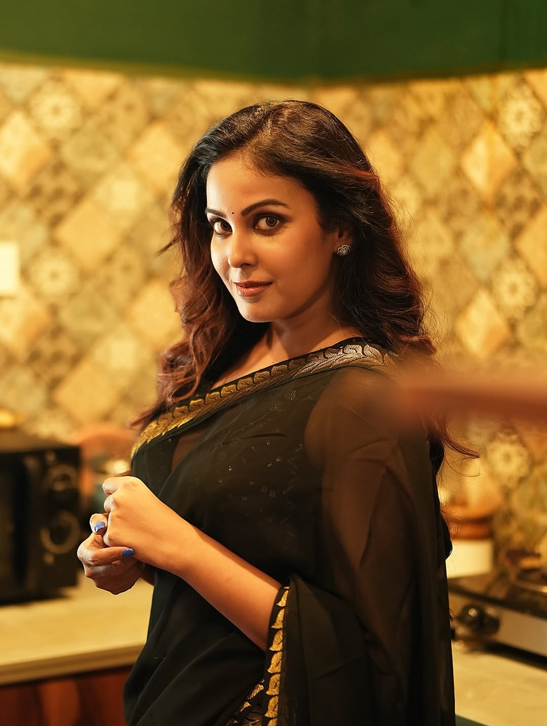 Chandni Tamilarasan's Radiant Smile In A Saree