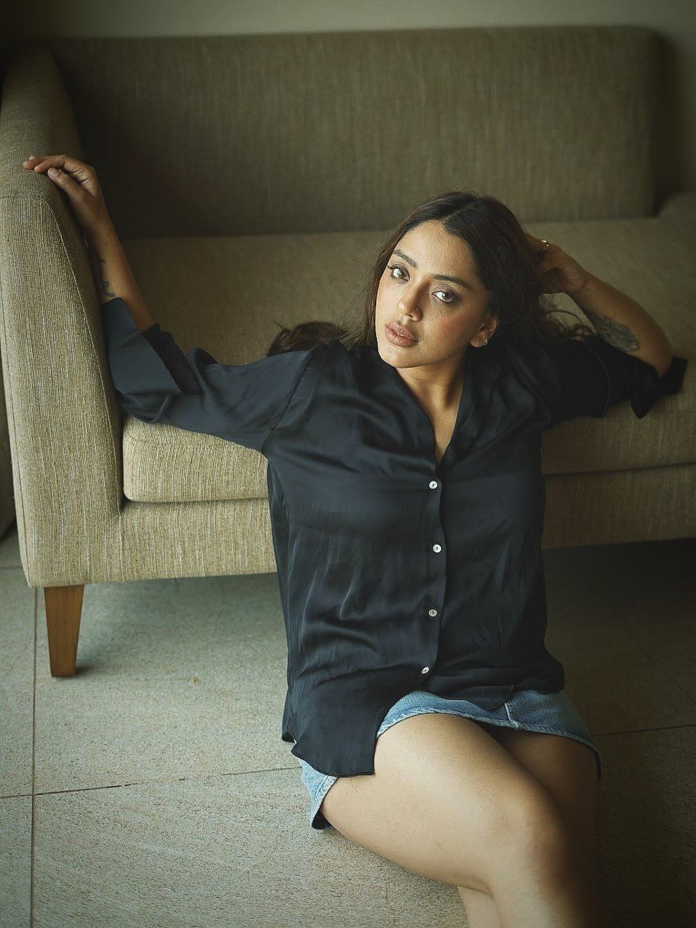 Deviyani Sharma Sits On Floor In A Denim Skirt