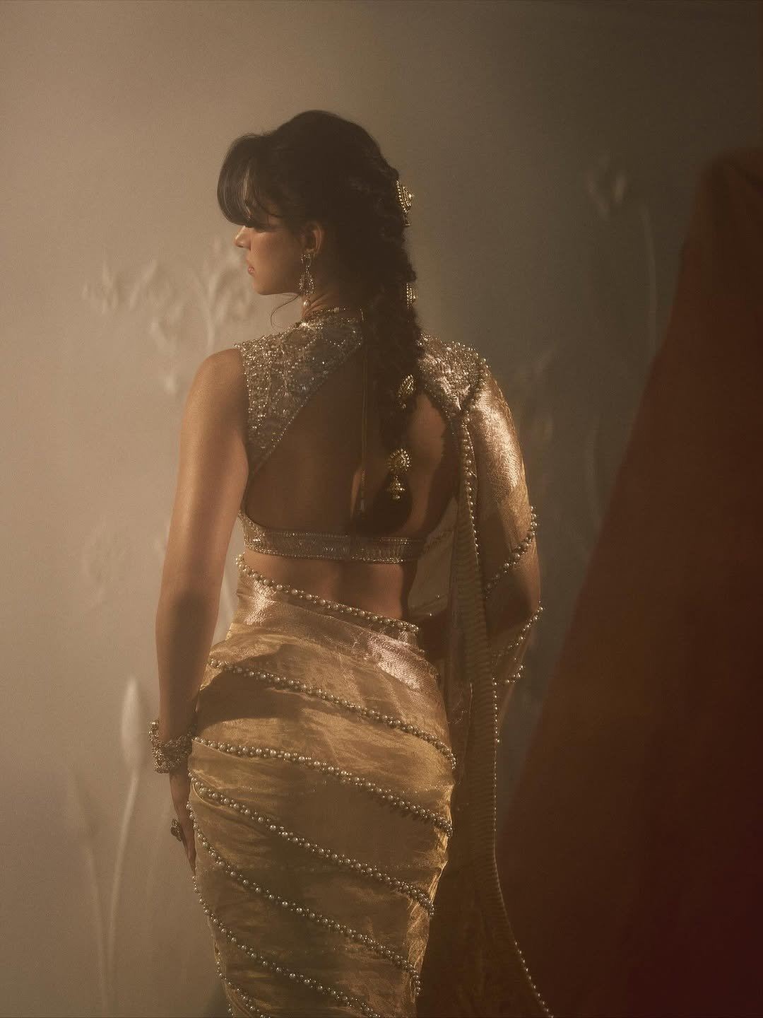 Disha Patani's Side Profile In A Golden Saree