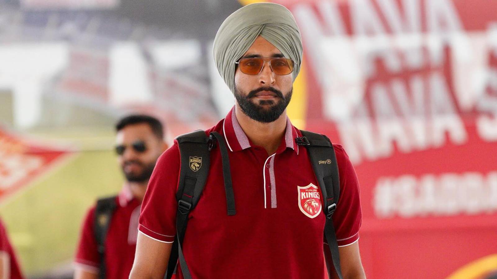 Harpreet Brar questioning fan on a bus