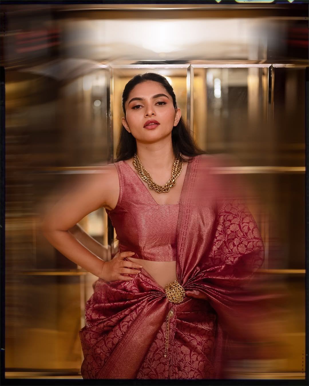 Kayadu Lohar Posing Fierce In Silk Pink Saree