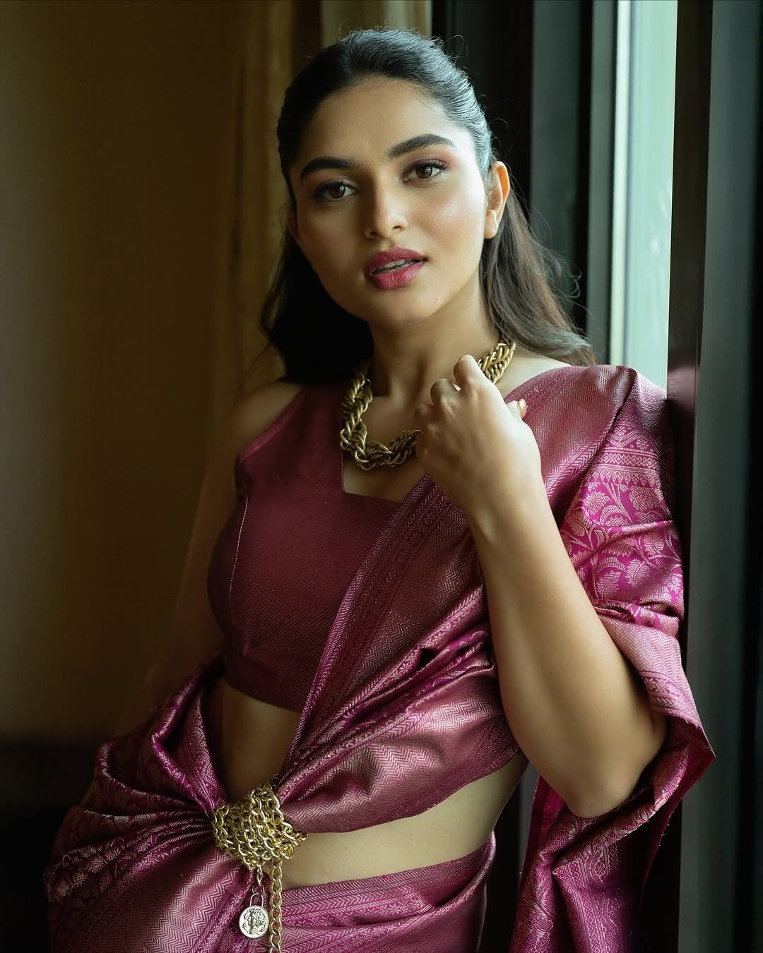 Kayadu Lohar Eating Donut In Chic Pink Saree Style