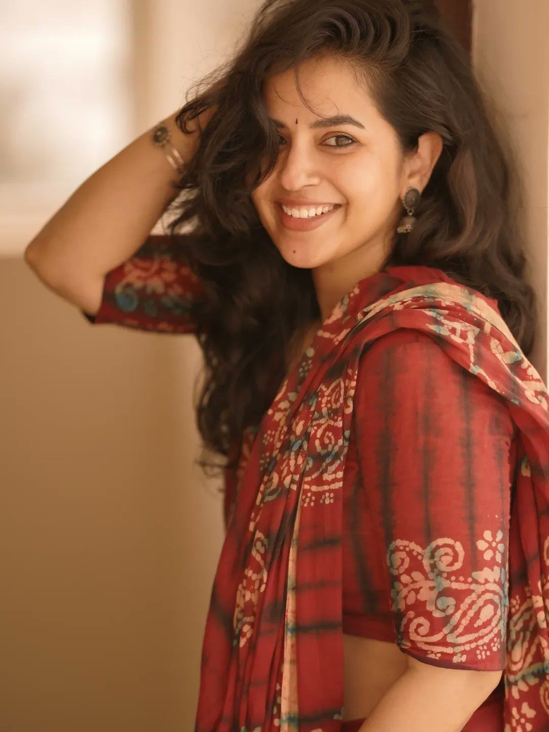 Komalee Prasad's Radiant Smile In A Red Saree