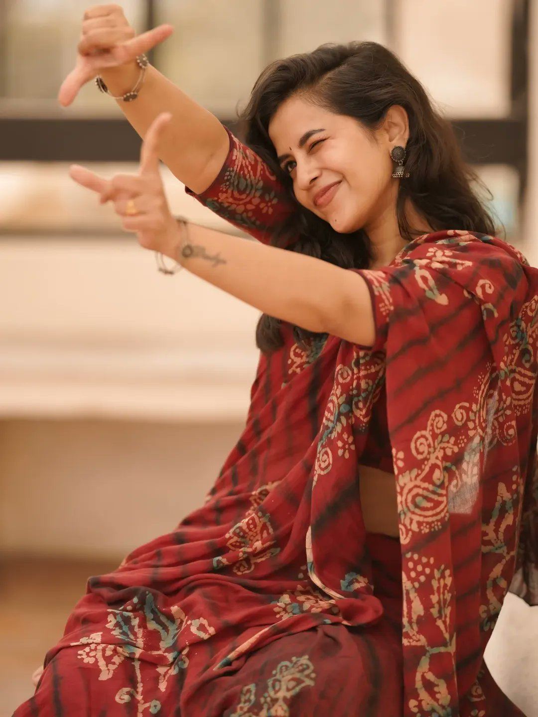 Komalee Prasad's Candid Laugh In A Red Saree