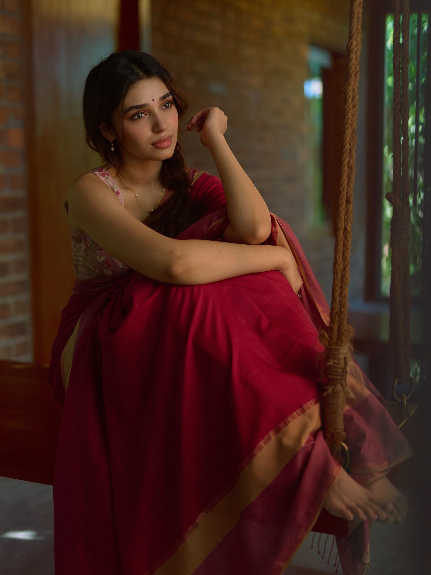 Krithi Shetty On Wooden Swing