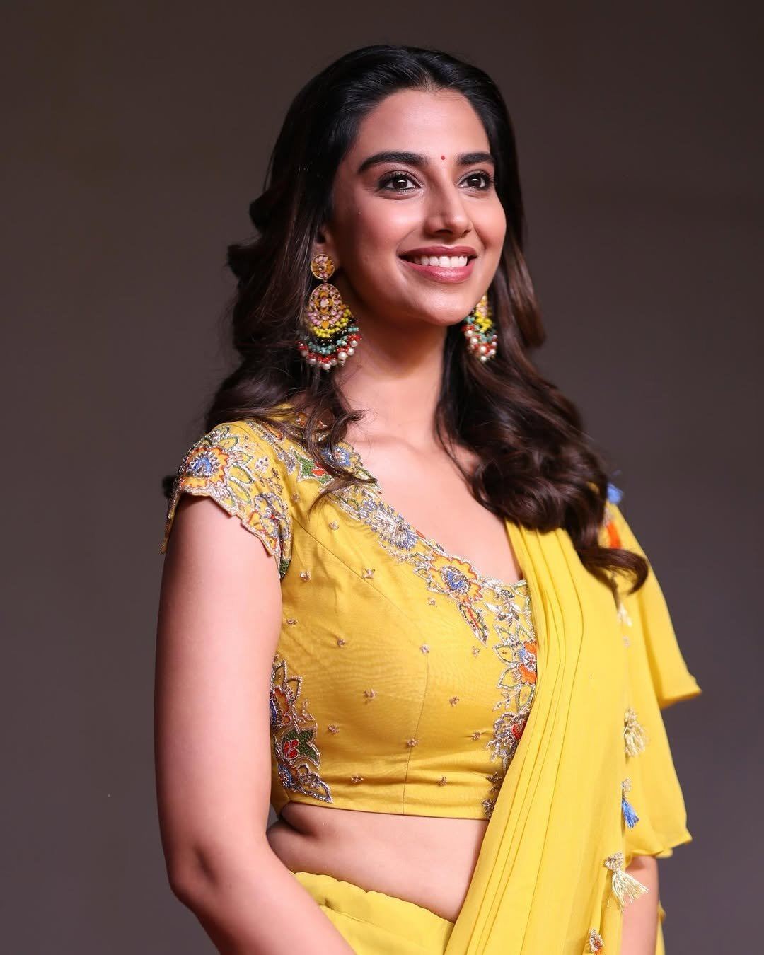 Meenakshi Chaudhary Radiant Beauty In Yellow Glam