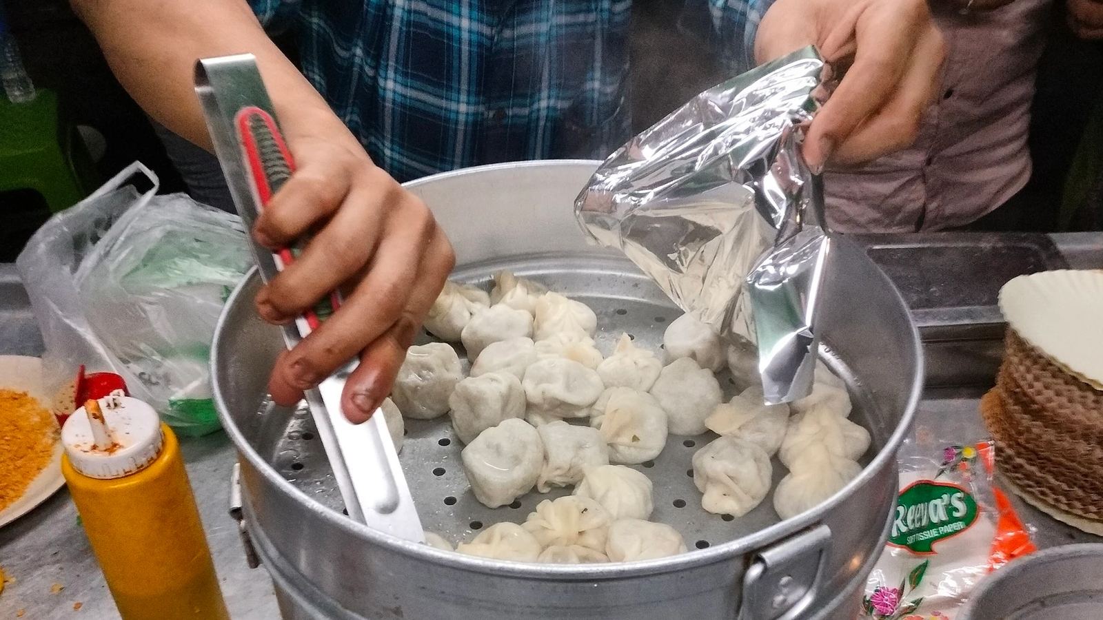 Momo seller busy at Bengaluru stall
