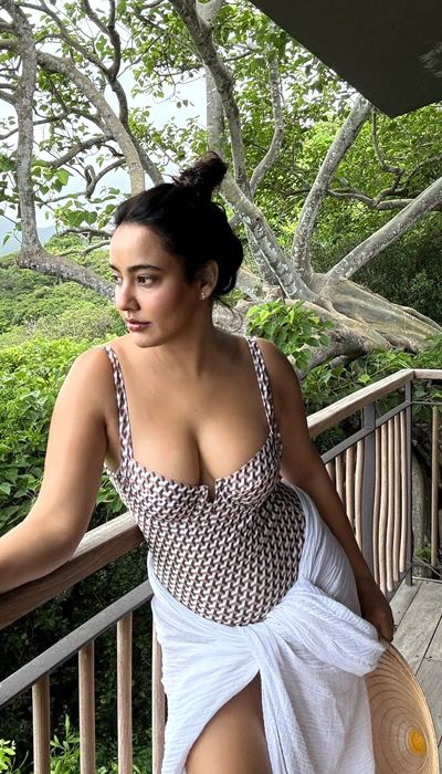 Neha Sharma Looks Away In A Candid Pose