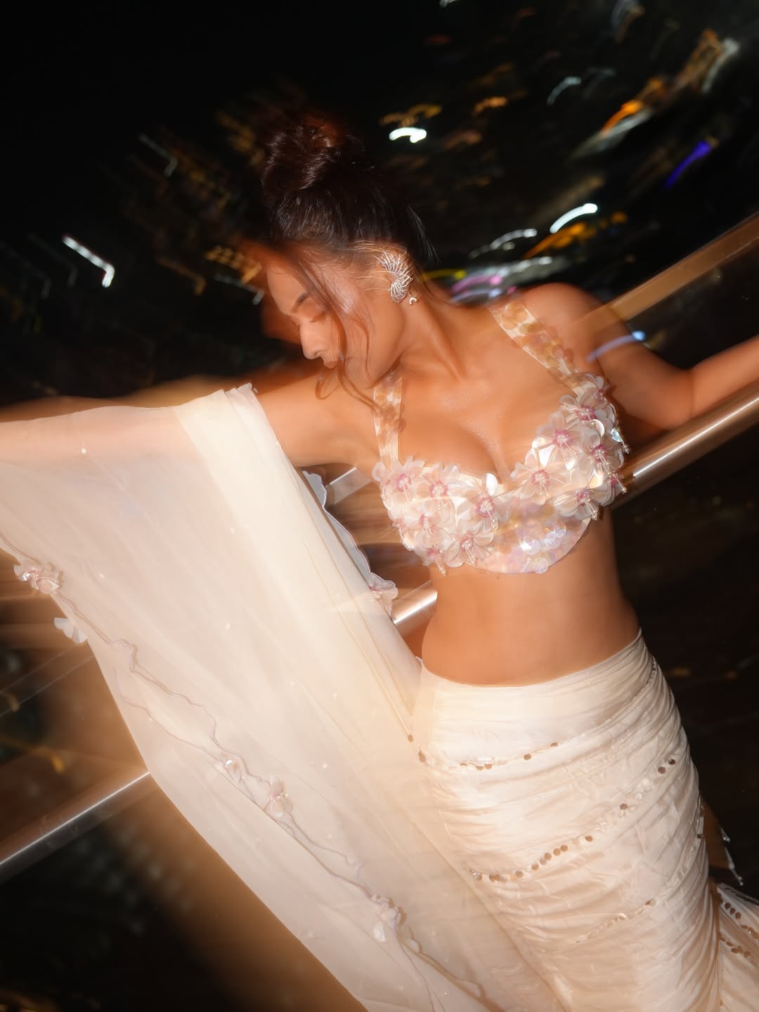 Nia Sharma's Bold Look On A Balcony At Night