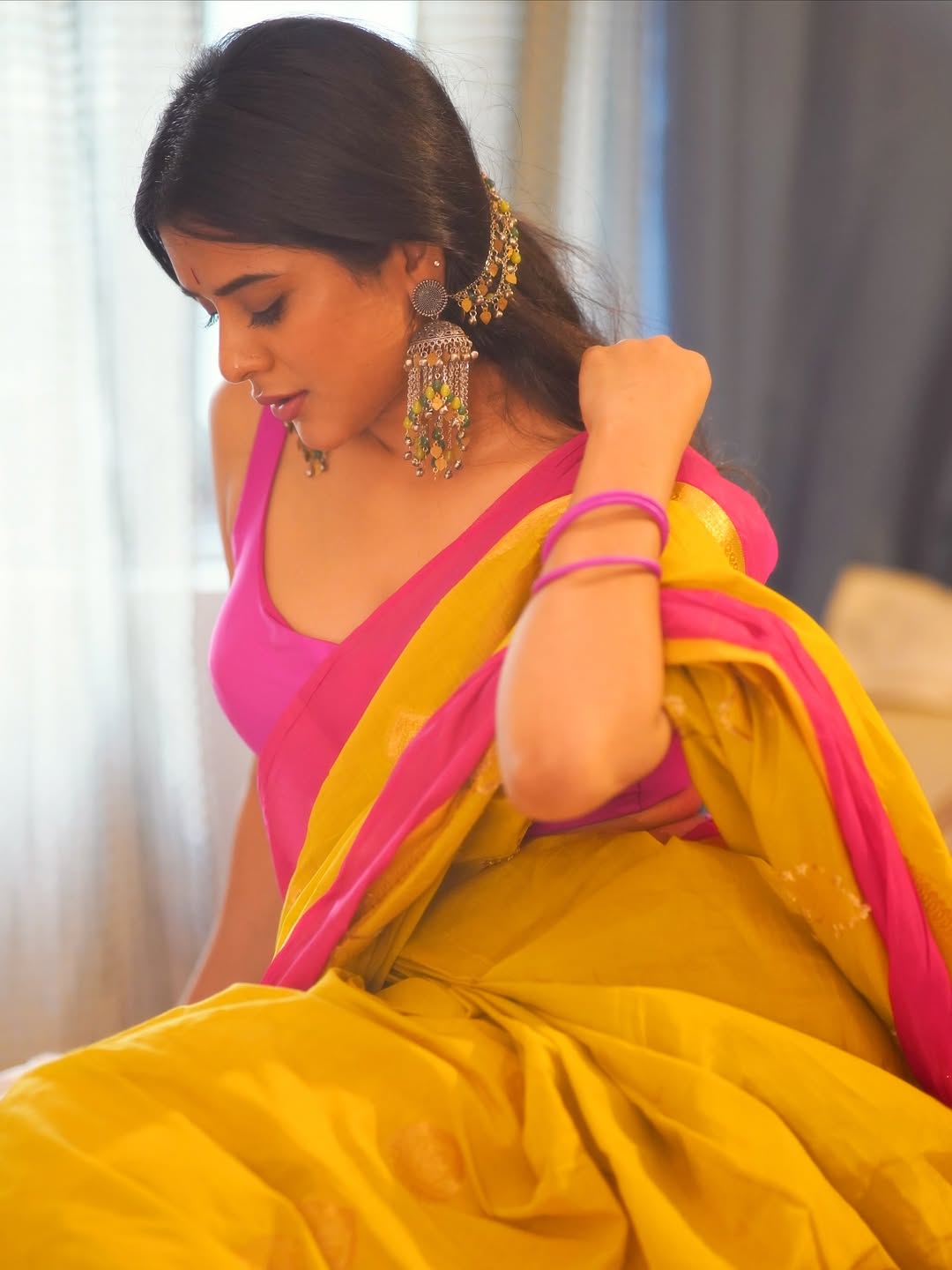 Nidhi Dudhraj's Back Pose Showing Hair Accessory