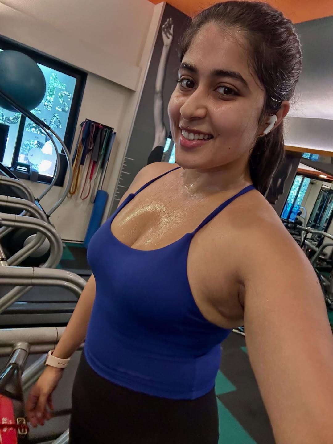 Nikita Sharma Poses With Hand On Hip In The Gym